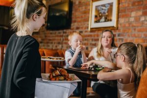 Family enjoying a meal | Restaurant in Barrow in Furness